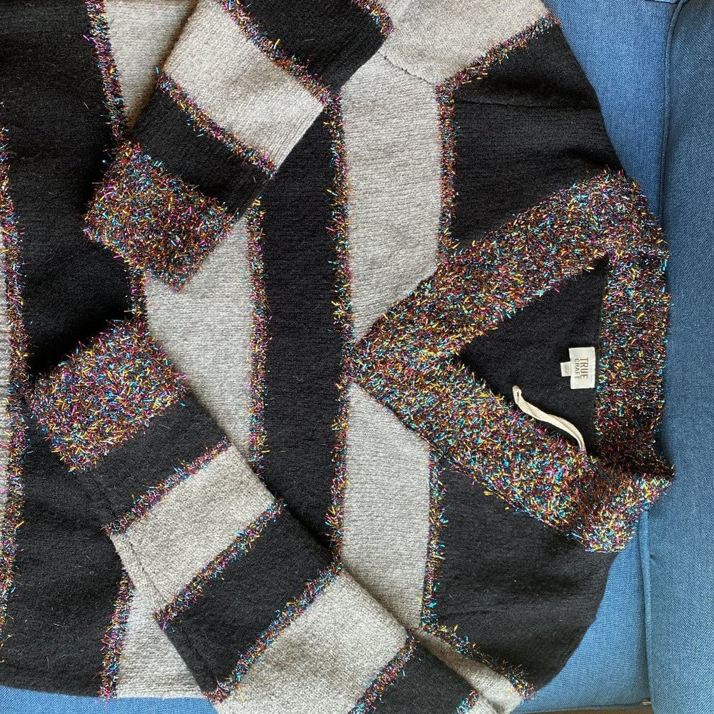 V neck sweater with black & grey vertical stripes, perfect for Christmas